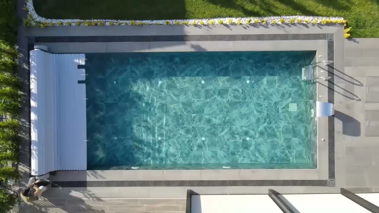 Poolcotec Marquise automatic pool cover roller housing at pool end